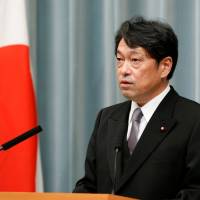 New Defense Minister Itsunori Onodera speaks at a news conference Thursday at the Prime Minister’s Office in Tokyo. New defense chief Onodera vows to restore trust, review strategy in face of North Korea threat