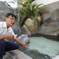 Tetsuya Morooka has been offering disaster victims and volunteers free entry to the hot springs at his traditional inn in Asakura, Fukuoka Prefecture. | KYODO