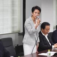 Outgoing Democratic Party chief Renho speaks to party members at a meeting Tuesday at the party headquarters in Tokyo. The main opposition is set to choose its new leader on Sept. 1. | KYODO