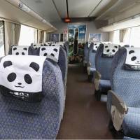 This Kuroshio express train, which has seat covers designed as panda faces, departs JR Tennoji Station in Osaka for Shirahama Station in Wakayama Prefecture on Saturday. | KYODO