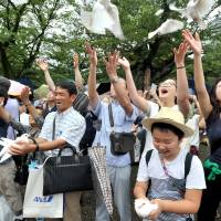 Visitors to Yasukuni Shrine in Tokyo release doves in a gesture of peace on Tuesday, the 72nd anniversary of Japan’s surrender in World War II. For young Japanese, war mostly seen as something from dim and distant past