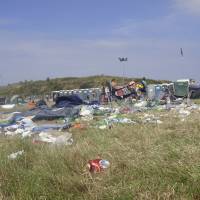 Total rubbish: Campers leave the Beach Break music event in Wales in 2011. Fuji Rock Festival prides itself on being one of the most environmentally friendly music events in the world, but some attendees worry that it will fall prey to the litter problems that plague other outdoor concerts. Fuji Rock's closing act was a load of trash