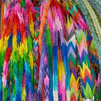 Shades of peace: Thousands of paper cranes are hung as symbols of a world without violence. | STEPHEN MANSFIELD