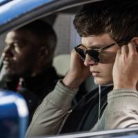 On the road: Ansel Elgort is at the wheel and Jamie Foxx is in the passenger’s seat in “Baby Driver.” 'Baby Driver': Things go fast with Baby on board
