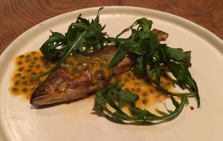Umbilical <em>Ayu</em> (sweetfish) confit, served with a passion fruit sauce at Umbilical in Sangenjaya. | ROBBIE SWINNERTON