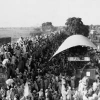 Muslim refugees crowd onto a train bound for Pakistan as it leaves the New Delhi area in India on Sept, 27, 1947. In the partition of the subcontinent into India and Pakistan after gaining independence from Britain in 1947, an estimated 1 million Hindus, Muslims and Sikhs were killed in rioting, and 12 million were uprooted from their homes. The unfinished business of Indian partition