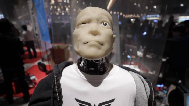 Modern look: A Mars Electric Inc. Teleporter humanoid robot sits on display during Slush Tokyo in March. The student-driven startup event is seeking to ignite the entrepreneurial spirit in Japanese youth. Re-imagining Japan? Focus on the youth