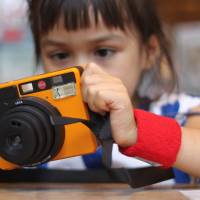 Shutterbug: The Leica workshop gives children an opportunity to learn how to use a camera. Learning to become snap happy with an instant camera in Japan