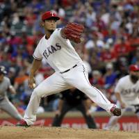 Texas Rangers’ Yu Darvish throws to against the Miami Marlins July 26 in the fourth inning of a baseball game in Arlington, Texas. Darvish was traded to the Los Angeles Dodgers Monday at the deadline. MLB-best Dodgers go all-in, grab Darvish from Rangers at trade deadline in World Series quest