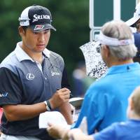 Hideki Matsuyama signs an autograph after a practice round Tuesday ahead of the PGA Championship at Quail Hollow in Charlotte, North Carolina. Matsuyama 'going backward' ahead of PGA Championship