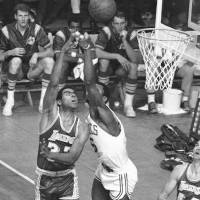 The Los Angeles Lakers’ Tommy Hawkins shoots over Boston Celtics star Bill Russell in an April 1968 game at Boston Garden. Hawkins, the first black athlete to earn All-America honors in basketball at Notre Dame, died on Wednesday. Former Notre Dame star, NBA forward Tommy Hawkins dies at 80