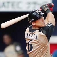 Hokkaido Nippon Ham\'s Sho Nakata hits a solo home run in the ninth inning of the Fighters\' 7-1 win over the Hawks on Monday. | KYODO
