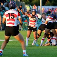 Moe Tsukui passes the ball to Mayu Shimizu during Japan’s Women’s Rugby World Cup game against France in Dublin on Tuesday. Japan crushed by France in Women's Rugby World Cup opener