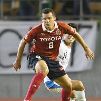 Nagoya\'s Washington controls the ball during his team\'s win over Hachinohe during their Emperor\'s Cup match on Wednesday in Nagoya. | AP