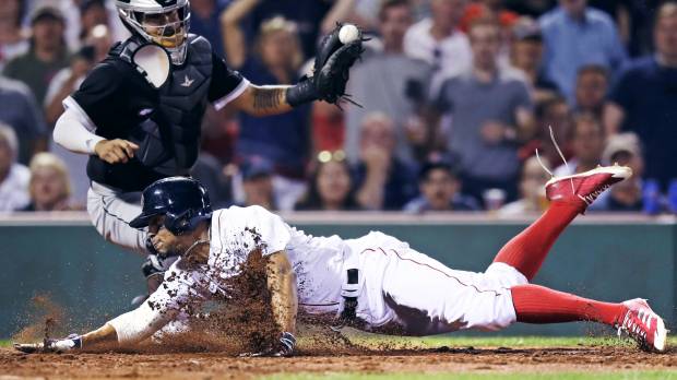 Boston shortstop Xander Bogaerts, seen here scoring against the Chicago White Sox last week, is just one of the young guns who have helped power the Red Sox into first place in the AL East. Patience with young players yielding returns for Red Sox