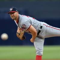 Washington’s Matt Grace pitches against San Diego in the first inning on Friday. Grace solid for Nats in rare start