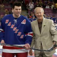 Former New York Rangers star Jean Ratelle (right), seen in an April 2016 file photo with Jaromir Jagr, will have his No. 19 retired this season. Ratelle, Lindros to have numbers retired