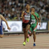 Abdul Hakim Sani Brown runs during the 100-meter heats at the IAAF World Championships on Friday in London. | AP