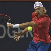Canada’s Denis Shapovalov plays a shot from Rafael Nadal in their third-round match at the Rogers Cup on Thursday night. Shapovalov won 3-6, 6-4, 7-6 (7-4). Nadal upset by Canadian teen in Montreal