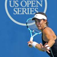 Garbine Muguruza prepares to hit a return against Karolina Pliskova during their semifinal match at the Western and Southern Open on Saturday in Mason, Ohio. Muguruza downs Pliskova to move into final