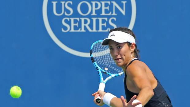 Garbine Muguruza prepares to hit a return against Karolina Pliskova during their semifinal match at the Western and Southern Open on Saturday in Mason, Ohio. Muguruza downs Pliskova to move into final