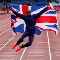 Mo Farah jumps for joy after winning the men’s 3,000 meters at the Diamond League meet in Birmingham, England, on Sunday. Farah wins final track race in Britain