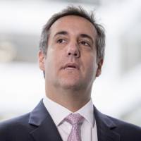 President Donald Trump’s lawyer, Michael Cohen, appears in front of members of the media after a closed-door meeting with the Senate Intelligence Committee on Capitol Hill Tuesday in Washington. Trump lawyer Cohen tells Senate panel proposed Moscow Trump Tower 'solely a real estate deal'
