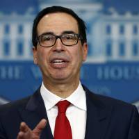 Treasury Secretary Steven Mnuchin speaks during a news briefing at the White House in Washington on Aug. 25. Mnuchin: Congress must tie Harvey aid to raising debt limit