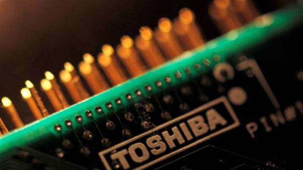 Toshiba Corp. selected a group led by Bain Capital as the buyer of its memory chip business, sources said Wednesday. Toshiba selects Bain-led group for chip unit sale, looks to get out of debt by next March