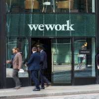 Pedestrians pass outside a shared office space operated by WeWork Cos Inc. in London last month. WeWork Japan set to debut in February with three central Tokyo locations