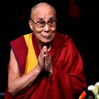 Tibetan spiritual leader the Dalai Lama attends an event called Compassion in Action in Londonderry, Northern Ireland, on Sunday. Dalai Lama says Buddha would have helped Myanmar's Muslims