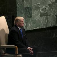 U.S. President Donald Trump sits after speaking during the U.N. General Assembly meeting in New York on Tuesday. Trump insists on 'America First,' but will anyone follow?