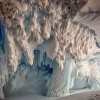An ice cave on the tongue of Erebus Glacier in Ross Land, Antarctica. Warm caves under Antarctic ice may harbor undiscovered life forms