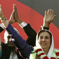 Benazir Bhutto holds her last public rally in Rawalpindi, Pakistan, on Dec. 27, 2007. Some theories behind former Pakistan leader Benazir Bhutto's 2007 assassination