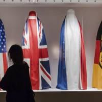 A visitor walks by an installation by Haitian artist Jean Ulrick Desert for an exhibition “Islam, It’s Also Our History” at the Espace Vanderborght in Brussels on Tuesday. Brussels exhibit tackles Islam in city scarred by terror