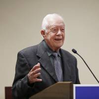Former President Jimmy Carter speaks at a Baptist conference in Atlanta on Sept. 15, 2016. Jimmy Carter criticizes Trump on North Korea, Syria, Mideast, moneyed 'oligarchy'