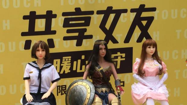 Sex dolls that can be rented out are displayed at a promotional event in Beijing on Thursday. Chinese police deflate company's plans to rent out 'shared girlfriends'