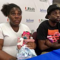 Tatyanna Watkins and her boyfriend, David Knight, hold a news conference Wednesday at Miami’s Jackson Memorial Hospital to discuss the birth of their daughter, Destiny Knight, who was born Sunday as Hurricane Irma was approaching South Florida. With emergency responders unable to make it to the scene, Watkins gave birth while she and Knight listened to instructions from a doctor over the phone. Helped over the phone, storm-stranded mom delivers Destiny, wouldn't think of naming her Irma