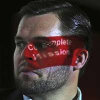 Part of a projection falls across Stuart Davis, a director at one of FireEye’s subsidiaries, as he speaks to journalists about the techniques of Iranian hacking in Dubai, United Arab Emirates, on Wednesday. Once called 'kittens' in the cyberspy world, Iran gains prowess: security experts