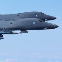U.S. Air Force B-1B bombers flanking Air Self-Defense Force F-2 fighters execute a bilateral mission over the Pacific Ocean on Monday, in response to North Korean missile tests. Mattis hints at U.S. military options, says no need to shoot down North Korean missiles yet