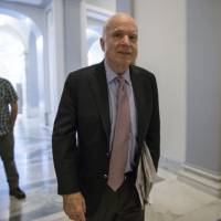 Sen. John McCain, R-Ariz., arrives at his office on Capitol Hill in Washington Monday amid a last-ditch GOP push to overhaul the nation’s health care system. Looking at the twilight of his career and a grim cancer diagnosis, McCain, who prides himself on an independent streak, could not be moved to go along with the Graham-Cassidy bill. McCain talks of Ted Kennedy and his fears, calls brain cancer prognosis 'very poor'