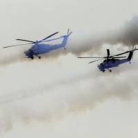 Helicopters fire during the joint Russian-Belarusian military exercises Zapad-2017 (West-2017) at the Luzhsky training ground in the Leningrad region on Monday. Russian helicopter fires on spectators at drills: report