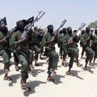 Hundreds of newly trained al-Shabab fighters perform military exercises in the Lafofe area some 18 km south of Mogadishu in 2011. Al-Shabab fighters killed four Somali government soldiers and briefly took a town near the border with Kenya on Monday, a military official said. Al-Shabab fighters briefly take Somali border town, kill four soldiers