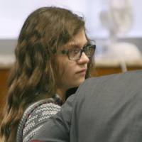 Anissa Weier listens to defense attorney Joseph Smith Jr. during closing arguments in her case before Waukesha County Circuit Court Judge Michael Bohren on Friday in Waukesha, Wisconsin. Wisconsin girl in Slender Man killing to be committed instead of jailed