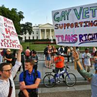 Protesters gather in front of the White House in Washington in July. Transgender troops can continue receiving transition-related medical treatment for now, the Pentagon said on Monday amid mounting challenges to President Donald Trump’s effective ban on funding such procedures as well as enlisting new openly transgender personnel. Pentagon to fund medical treatment for transgender troops into March