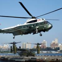 The Marine One helicopter with President Donald Trump arrives at the Downtown Manhattan Heliport in New York ahead of next week’s United Nations General Assembly, Sunday. Ahead of Trump's U.N. debut, advisers warn Pyongyang to drop weapons threat or face annihilation