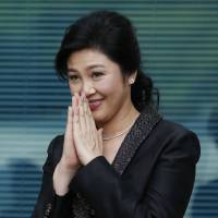 Yingluck Shinawatra Thai junta says three police officers helped Yingluck Shinawatra escape