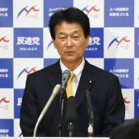 Democratic Party Secretary-General Atsushi Oshima attends a news conference on Monday. KYODO DP seeks to halt hemorrhaging of its lawmakers following prominent member's resignation