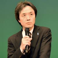 Kaoru Hasuike, who was abducted in 1978 in Niigata by North Korean agents and allowed to return to Japan in 2002, speaks in Kusatsu, Shiga Prefecture, on Saturday. Returnee Hasuike suggests offering electrical aid to North for remaining abductees