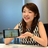 Ayako Shimizu, president of Hikari Lab, talks about the SPARX role-playing video game that her company introduced to Japan, during an interview in Tokyo earlier this month. Role-playing video game helps fight against depression for counselor-shy Japanese